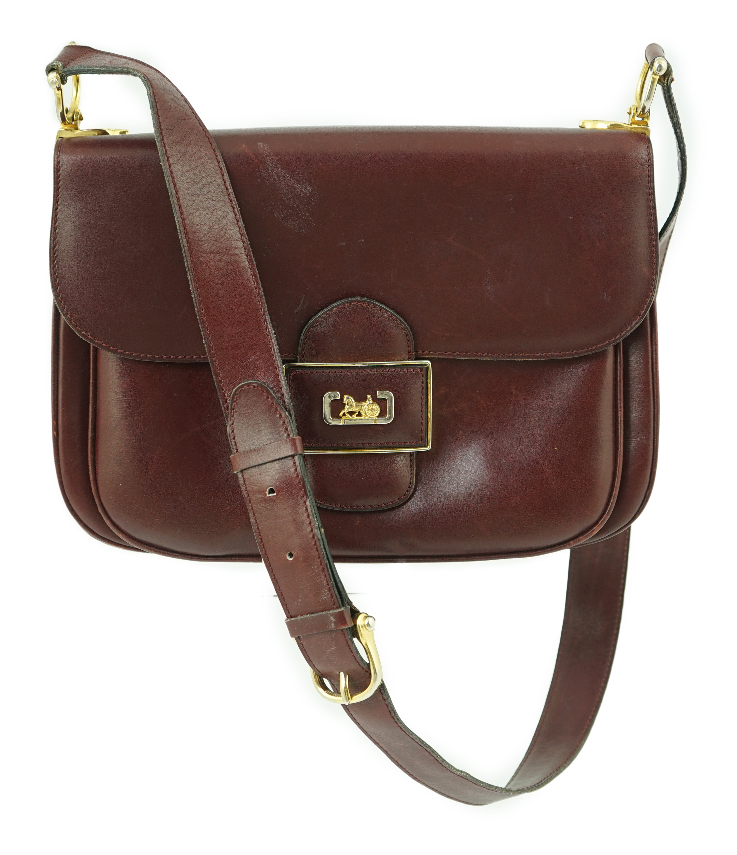 A vintage Celine horse carriage cargo flap burgundy leather shoulder bag, width 26cm, depth 3cm, height 18.5cm
